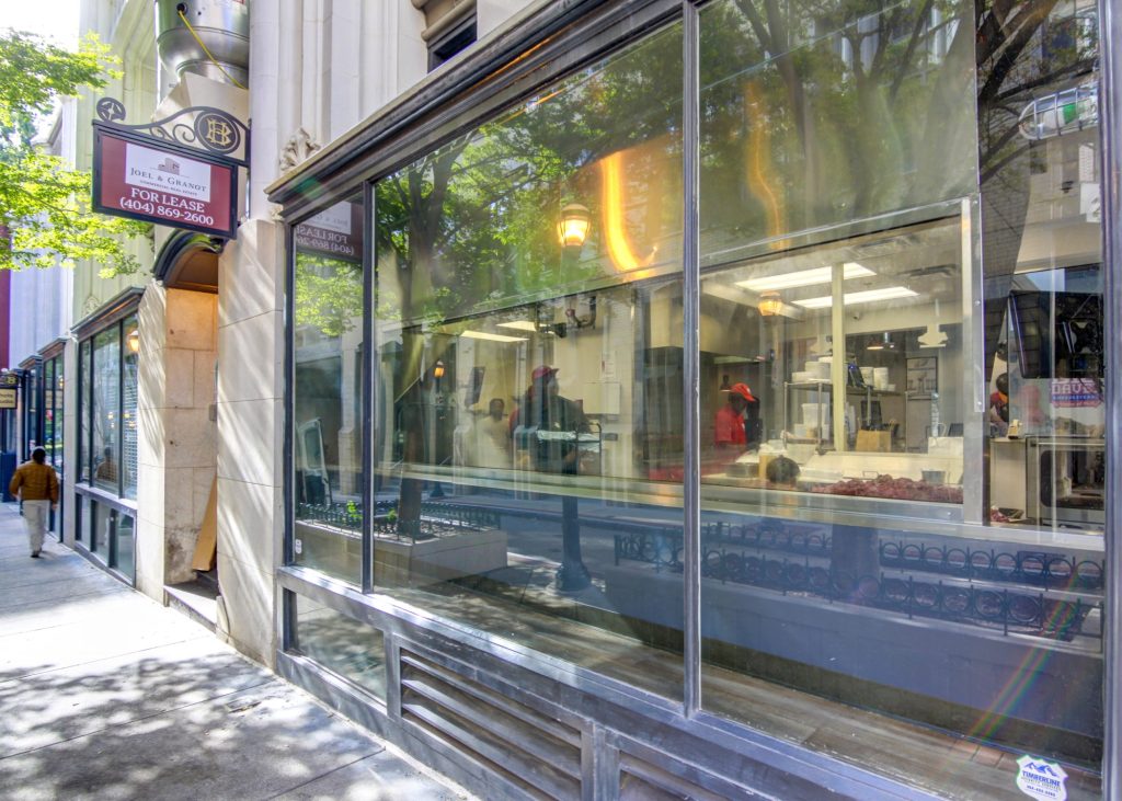 an exterior shot of Big Daves looking through large glass windows