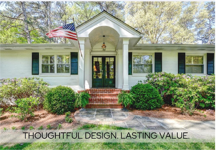The front of a white colonial style home